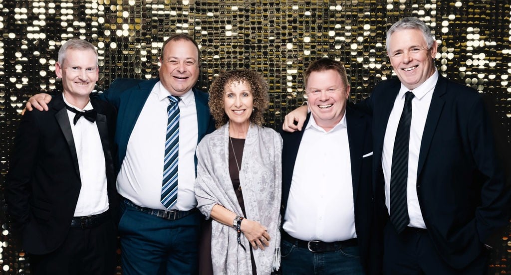 Five Threefold Group team members smiling together at the KAN 2026 Conference Awards gala evening.